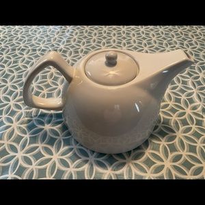 White ceramic tea pot